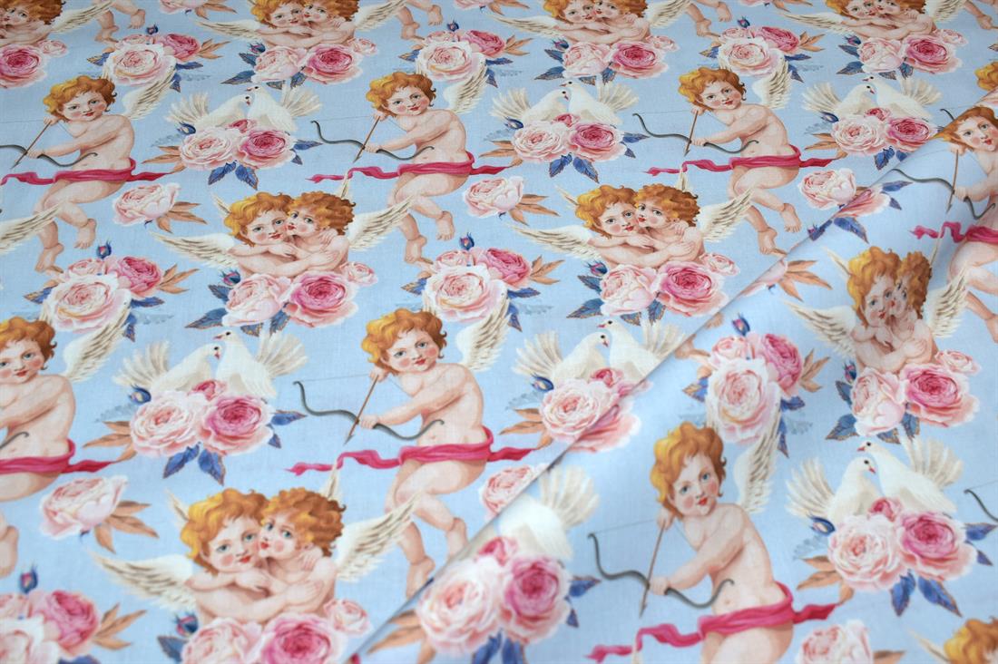 Light Blue Little Johnny Cupids Printed 100% Cotton Fabric