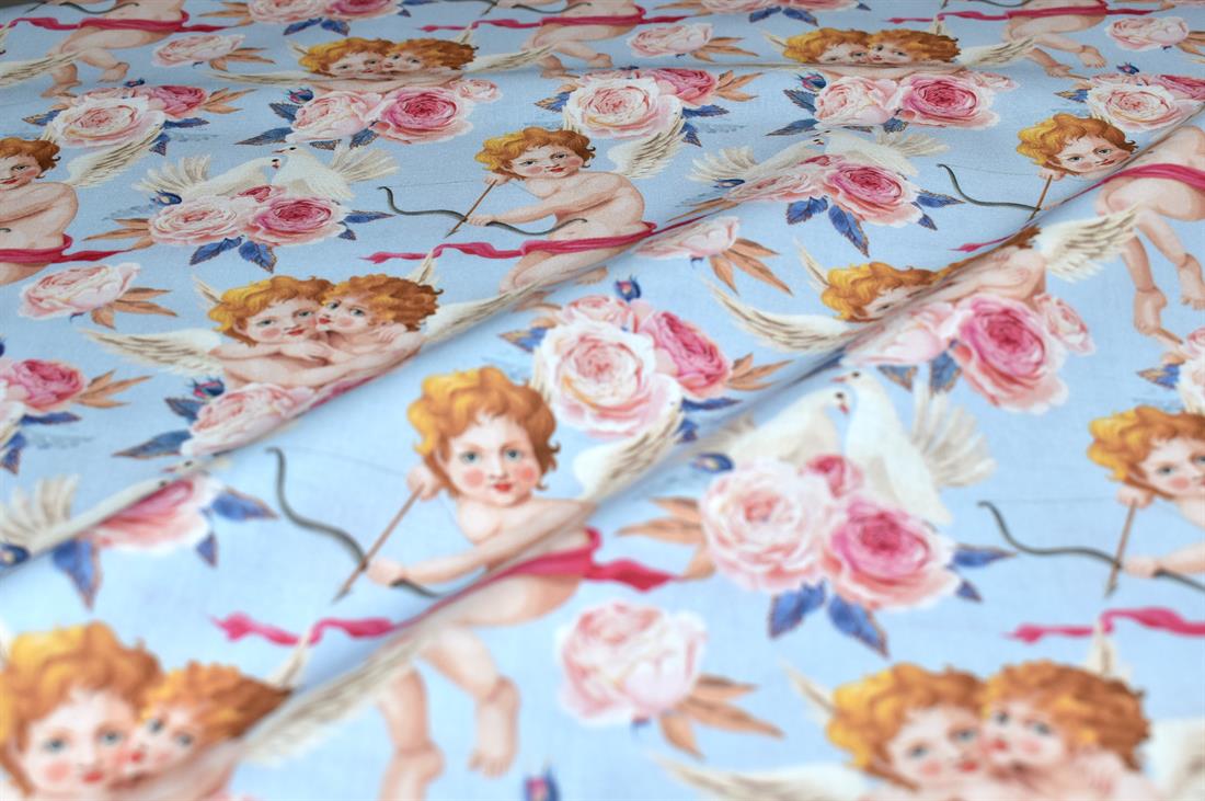 Light Blue Little Johnny Cupids Printed 100% Cotton Fabric