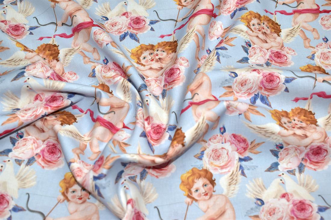 Light Blue Little Johnny Cupids Printed 100% Cotton Fabric