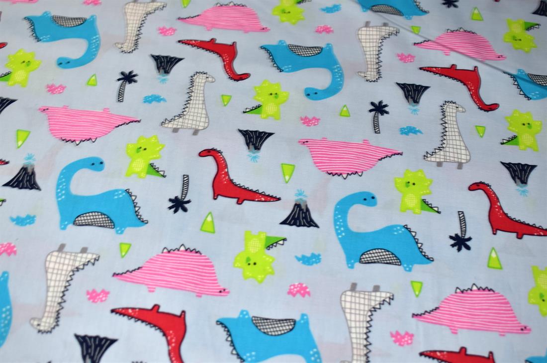 Light Blue Dinosaurs Printed Crafty Cottons Poplin