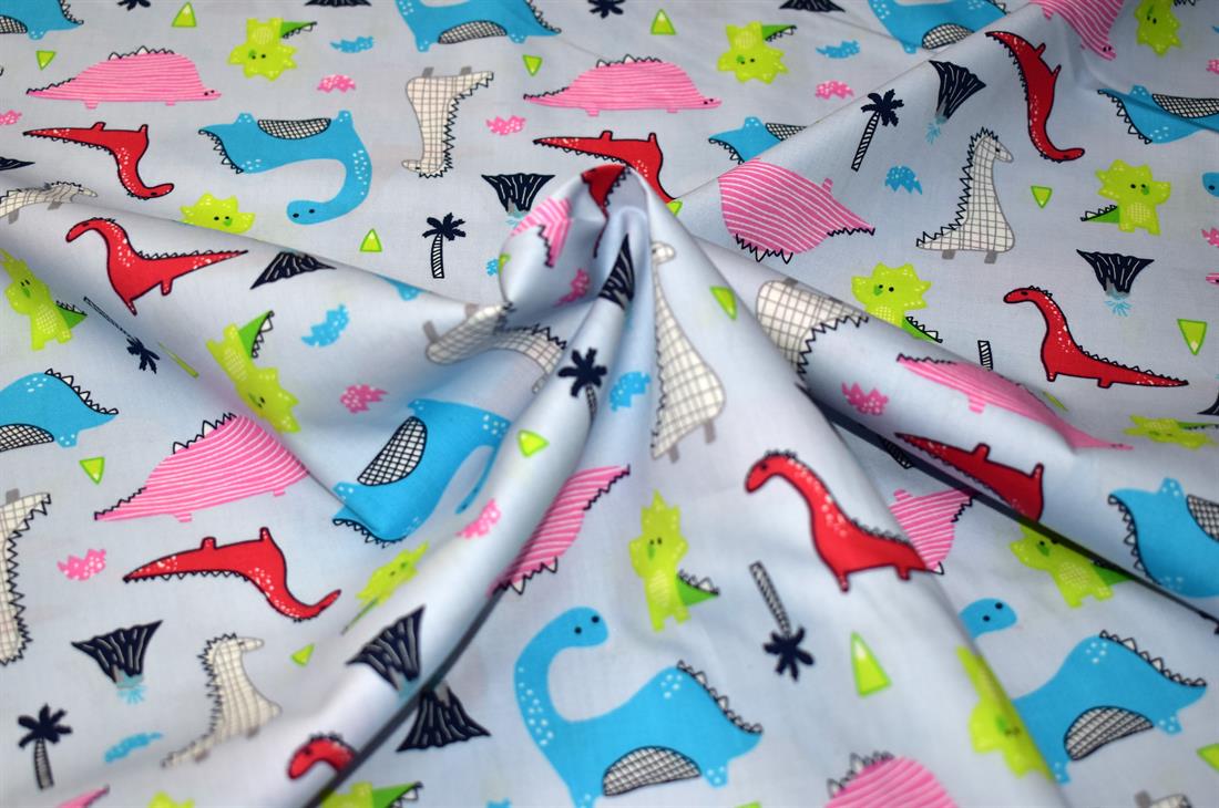 Light Blue Dinosaurs Printed Crafty Cottons Poplin