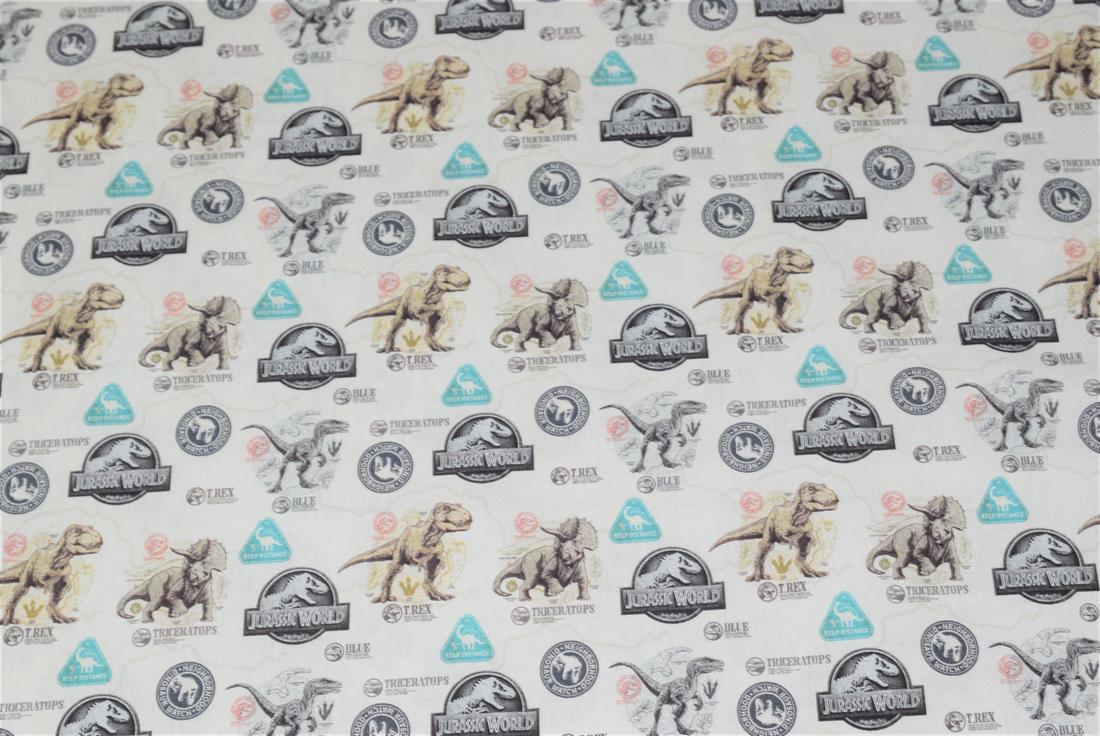 Cream Jurassic World Badge Cotton Printed Fabric