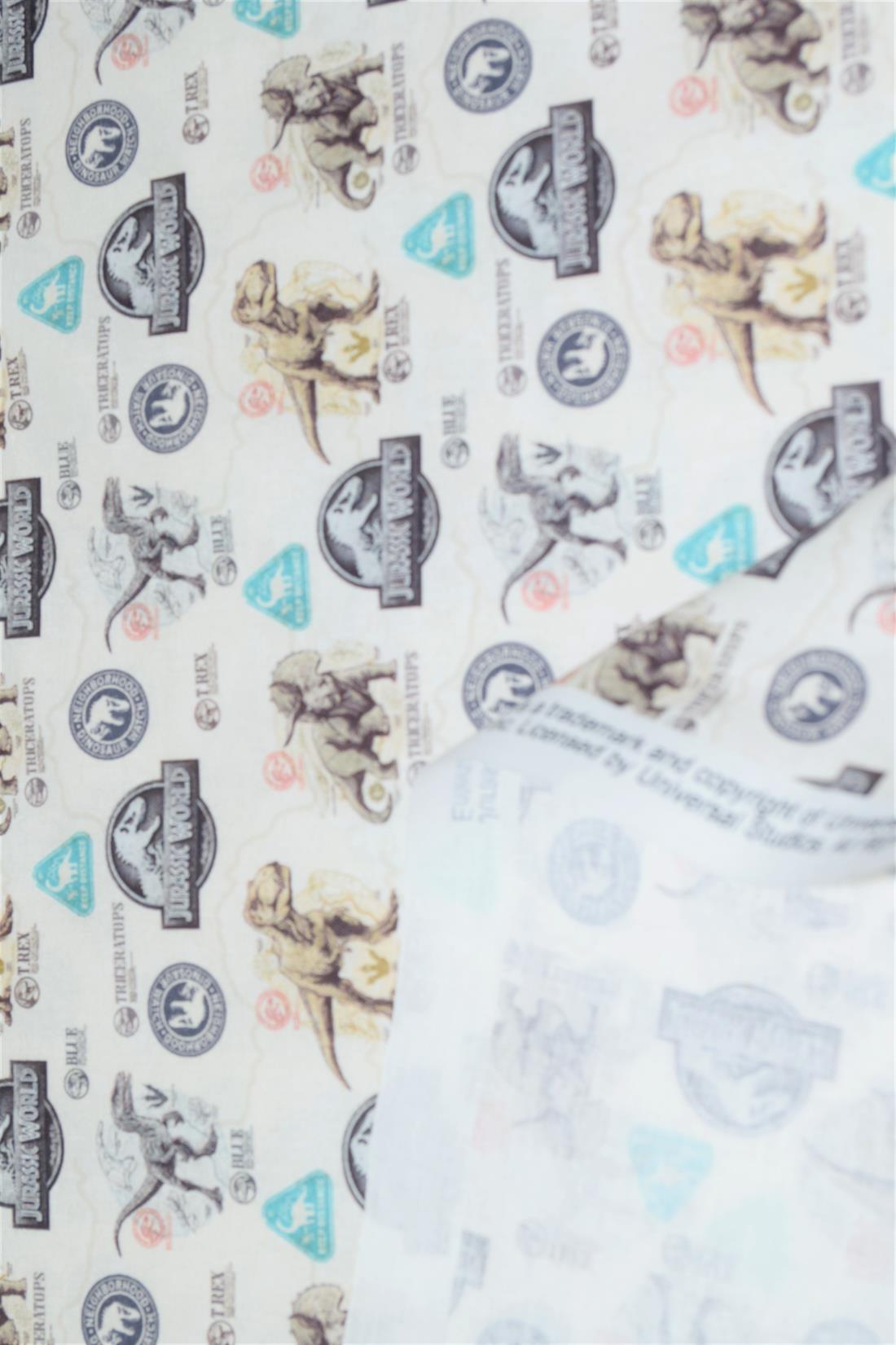 Cream Jurassic World Badge Cotton Printed Fabric