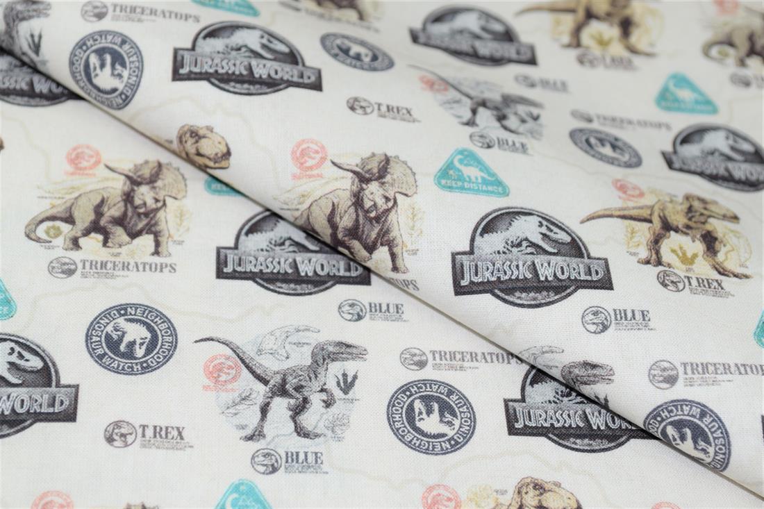 Cream Jurassic World Badge Cotton Printed Fabric