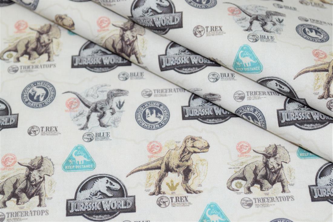 Cream Jurassic World Badge Cotton Printed Fabric