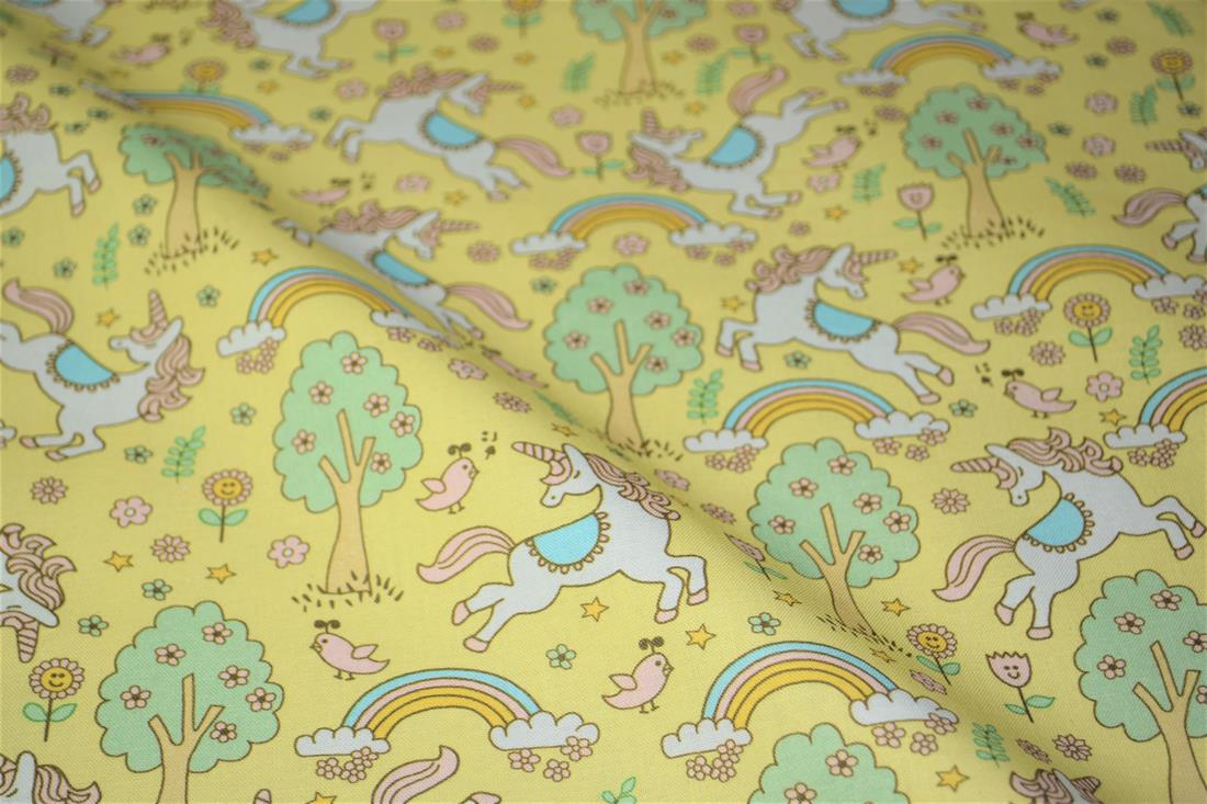 Yellow Rainbows and Unicorns Printed 100% Cotton Fabric