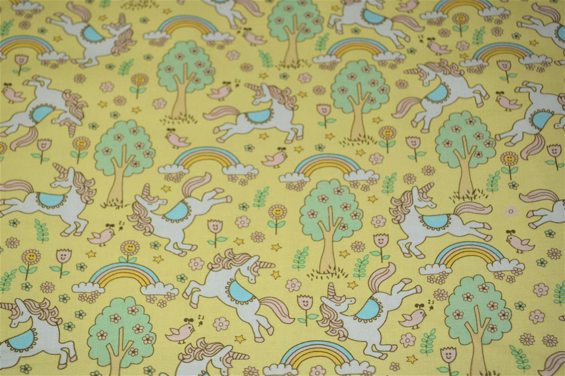 Yellow Rainbows and Unicorns Printed 100% Cotton Fabric