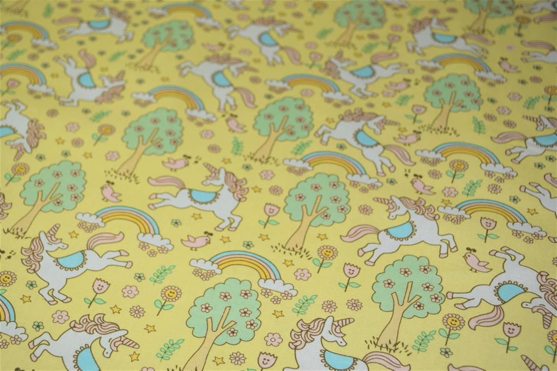 Yellow Rainbows and Unicorns Printed 100% Cotton Fabric