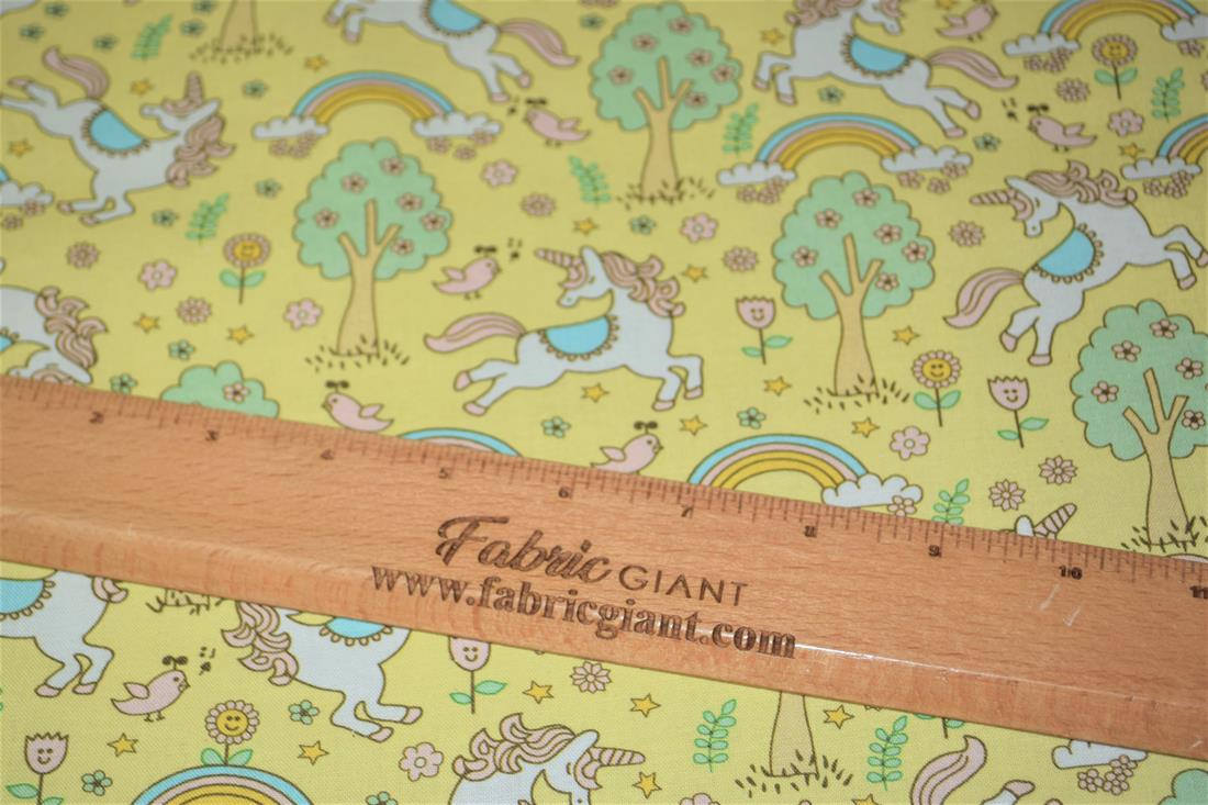 Yellow Rainbows and Unicorns Printed 100% Cotton Fabric