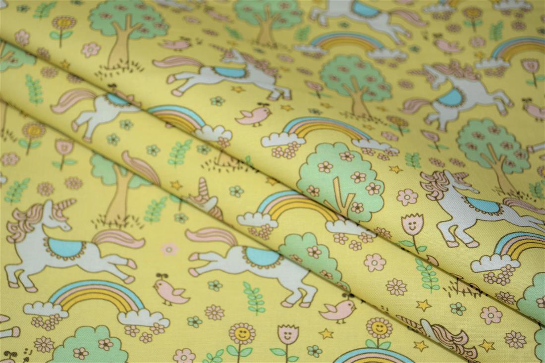 Yellow Rainbows and Unicorns Printed 100% Cotton Fabric