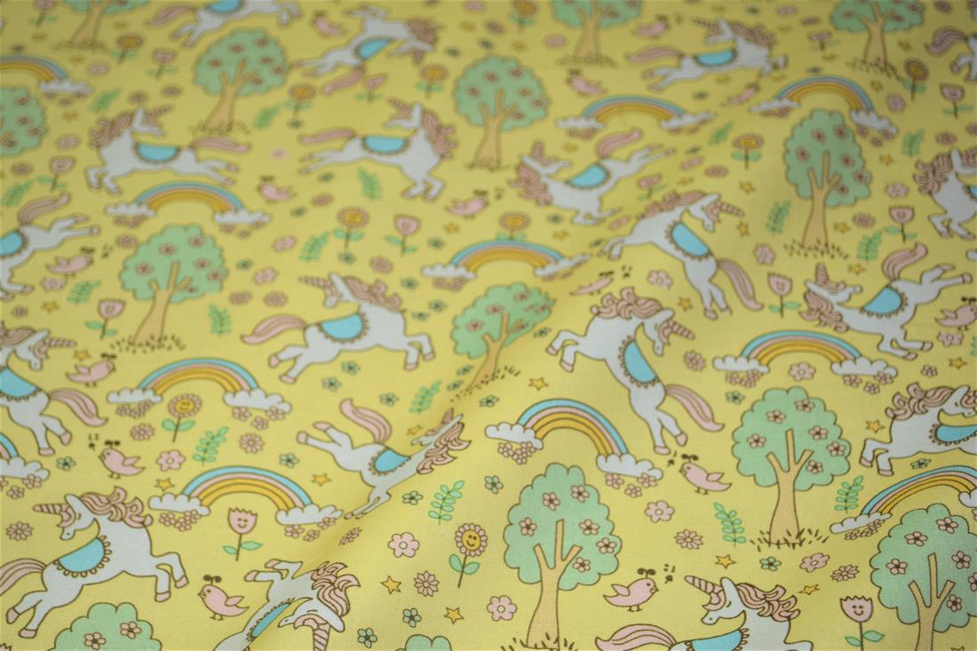 Yellow Rainbows and Unicorns Printed 100% Cotton Fabric