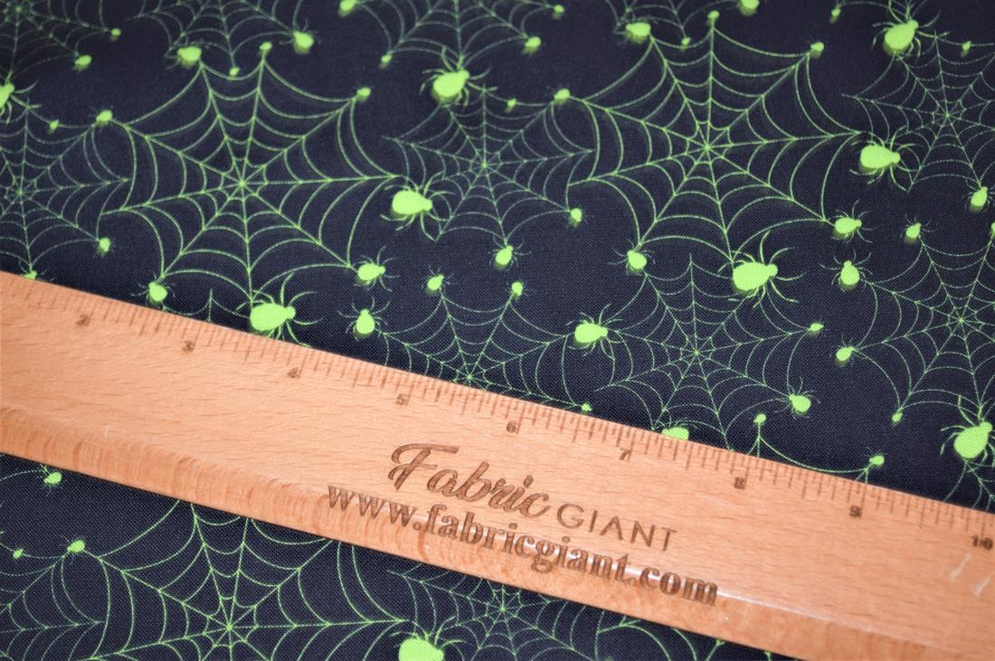 Black & Lime Printed 100% Cotton Glowing Spiders Fabric