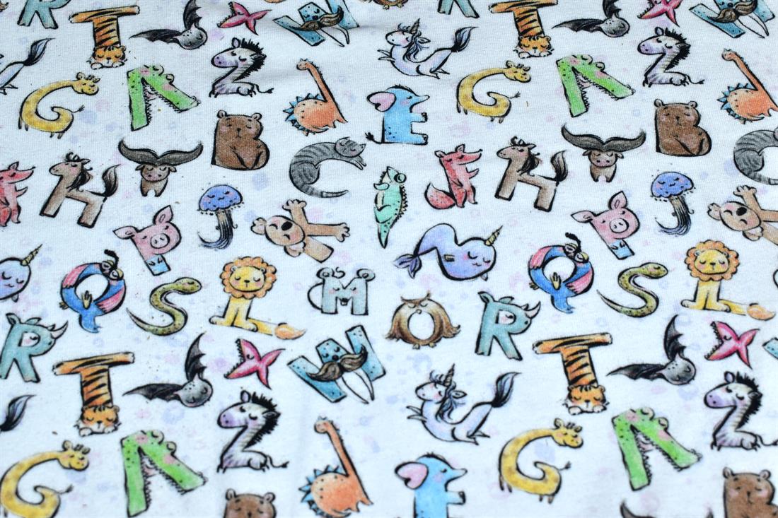 White Little Johnny Animal PrintThe Term Cotton Refers to the Part of…