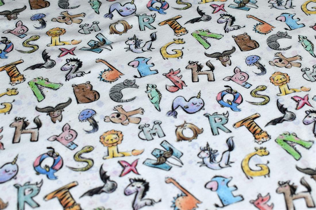 White Little Johnny Animal PrintThe Term Cotton Refers to the Part of…