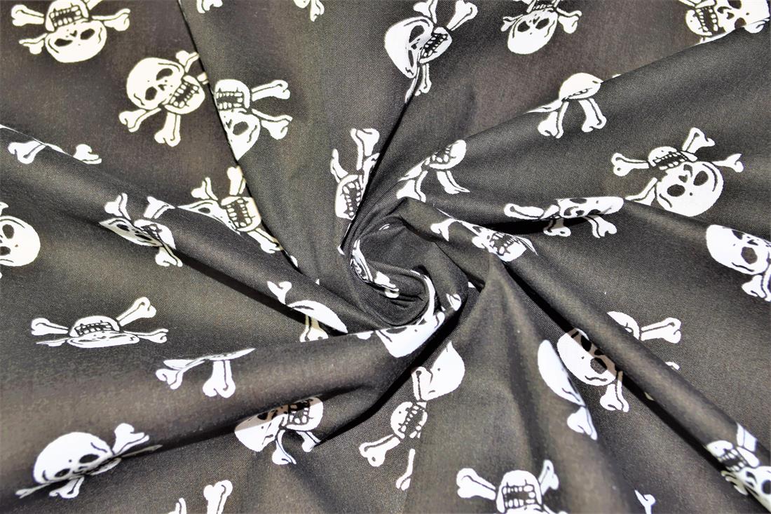 Black Skull and Cross Bones All Over Printed Poly Cotton Fabric