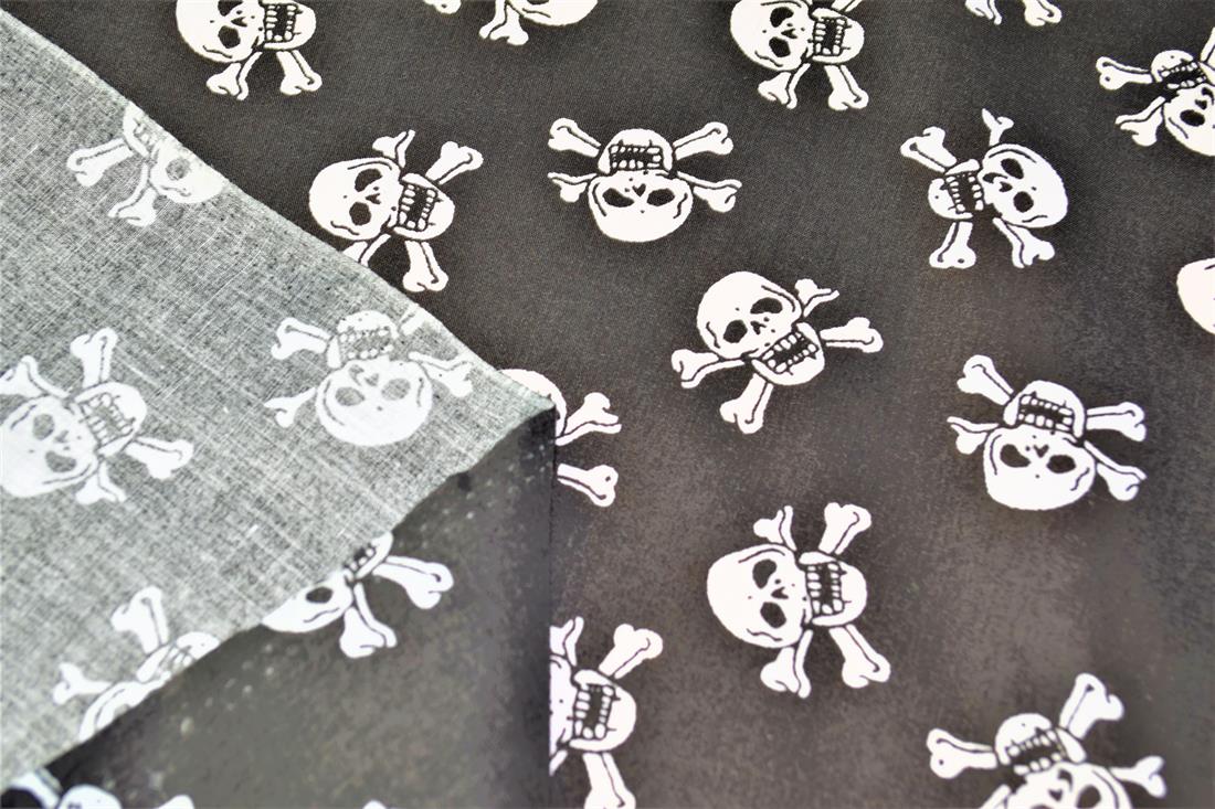Black Skull and Cross Bones All Over Printed Poly Cotton Fabric