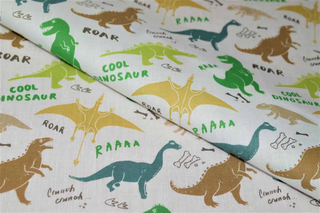 White Dinosaurs Printed Poly Cotton Fabric