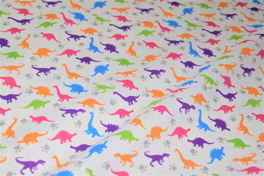 White Printed Poly Cotton Fabric, Dinosaur