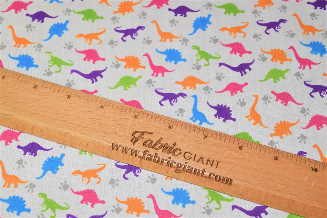 White Printed Poly Cotton Fabric, Dinosaur