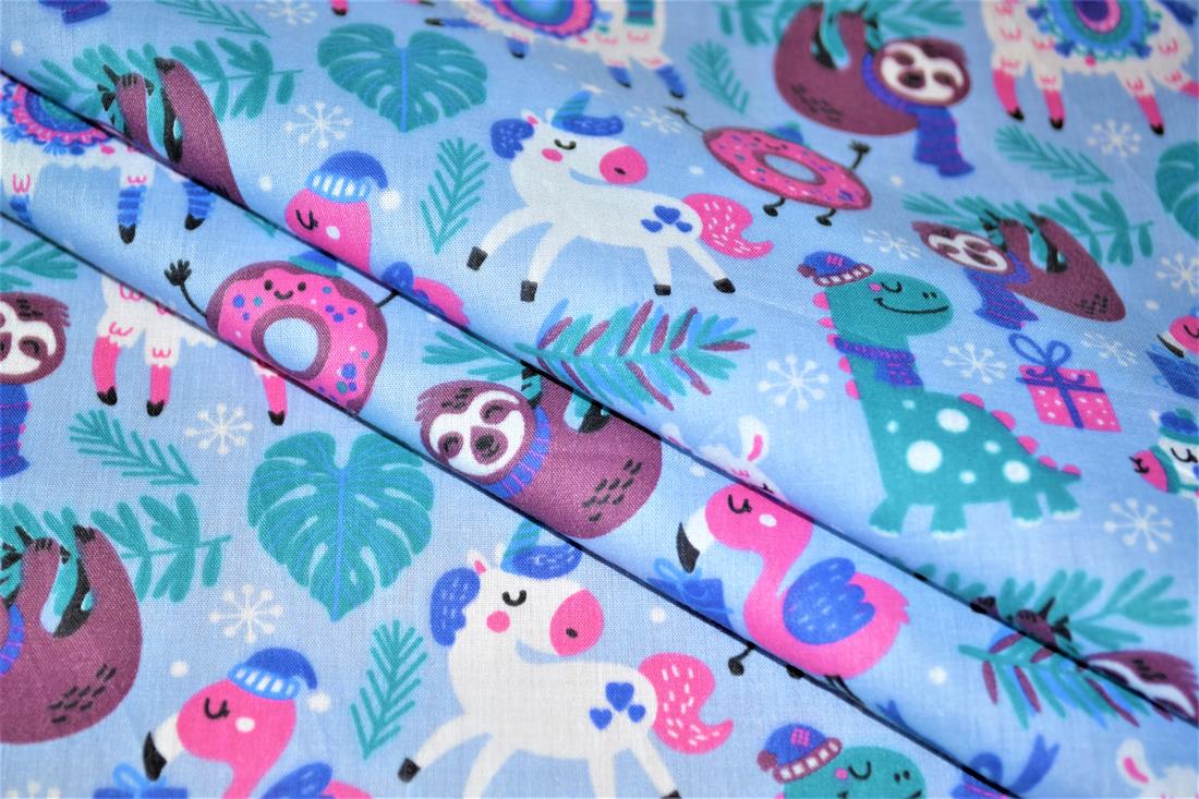 Blue MP Animal Xmas Mish Mash Polycotton A Playful Vibrant Printed…