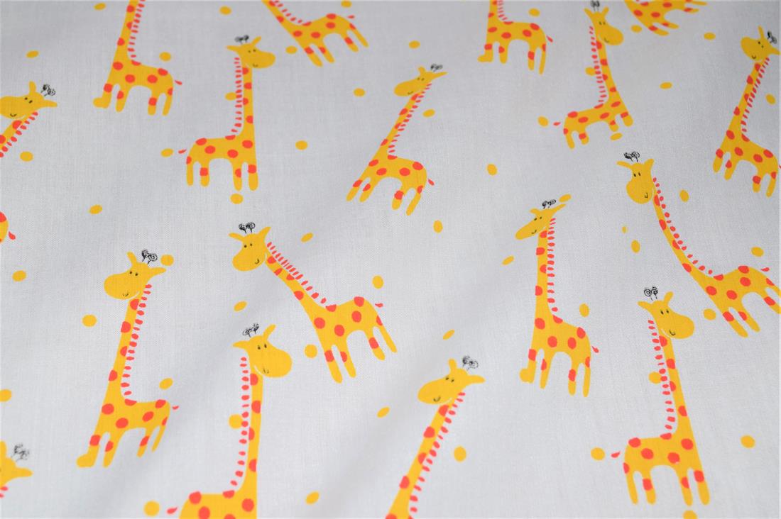 White Printed Polycotton Fabric, Giraffe Desing