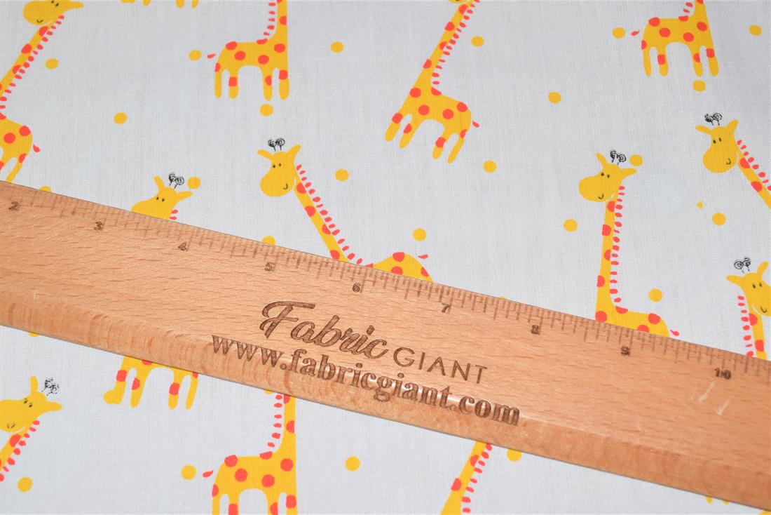 White Printed Polycotton Fabric, Giraffe Desing