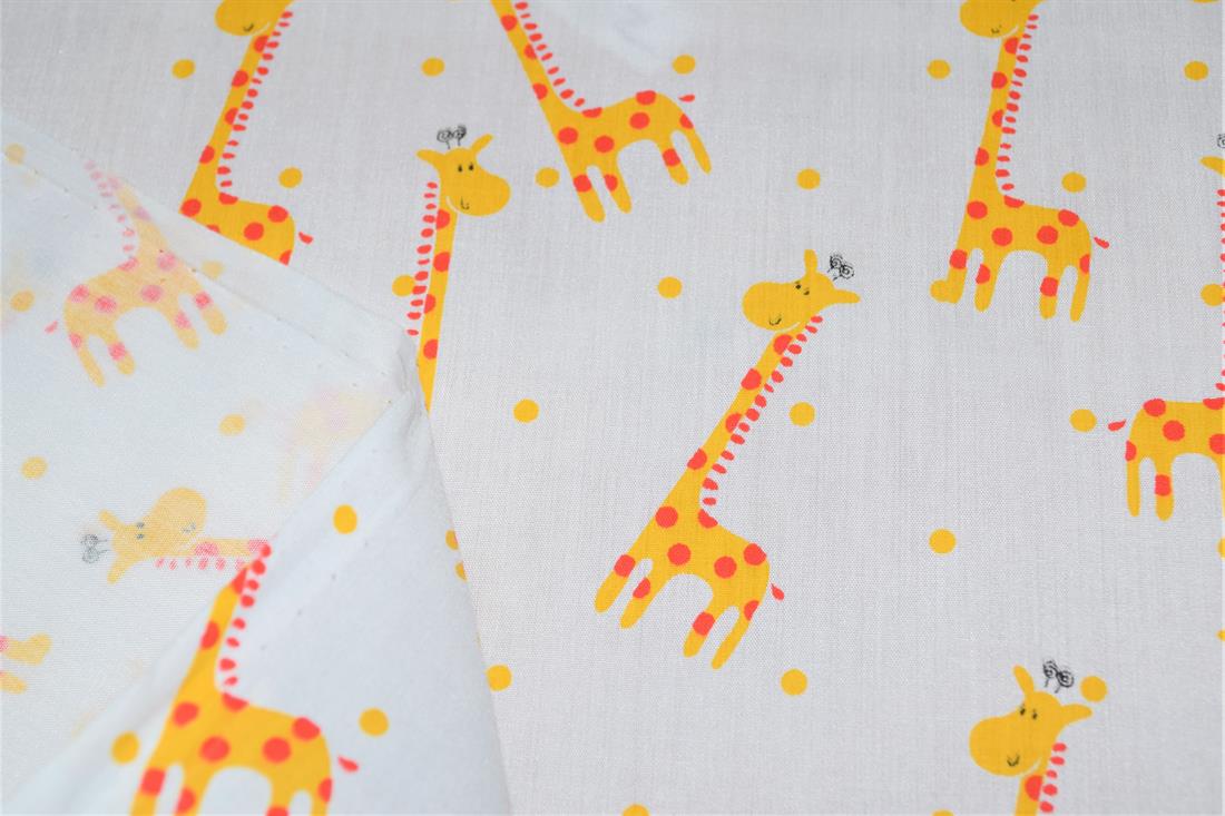 White Printed Polycotton Fabric, Giraffe Desing