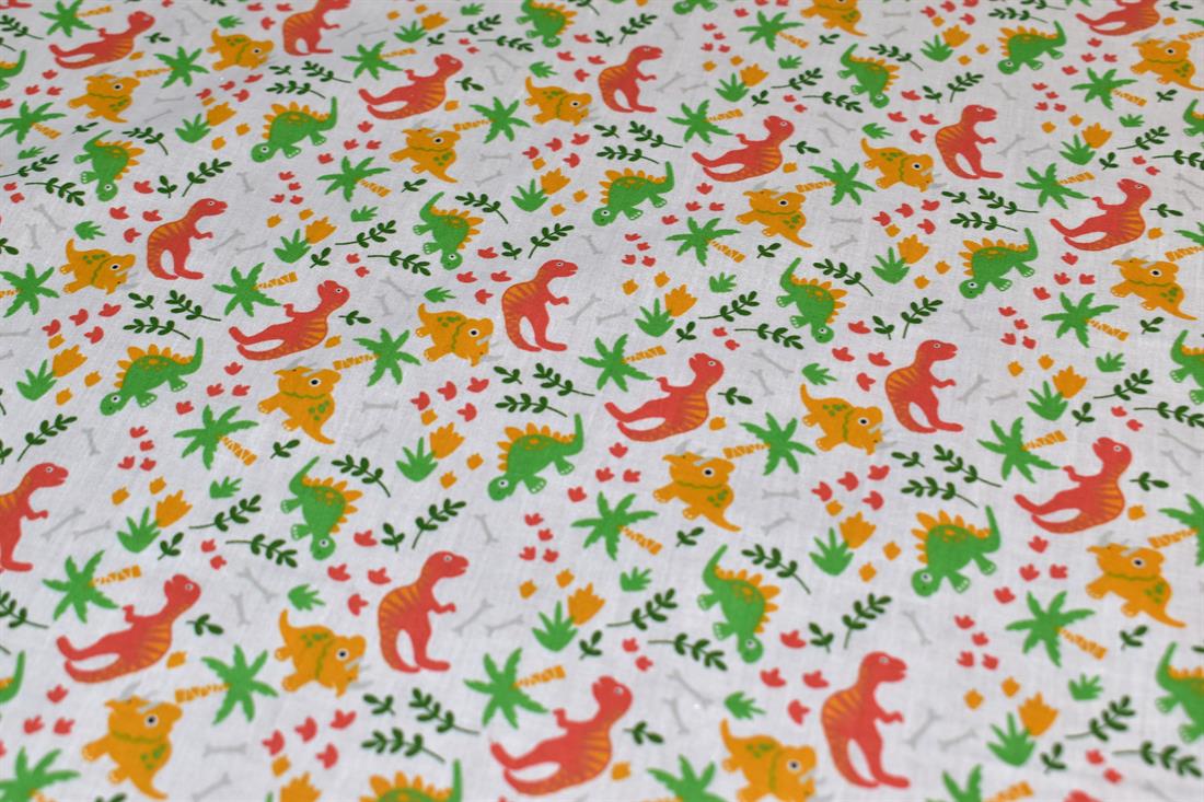 White Printed Dinosaur Polycotton Fabric