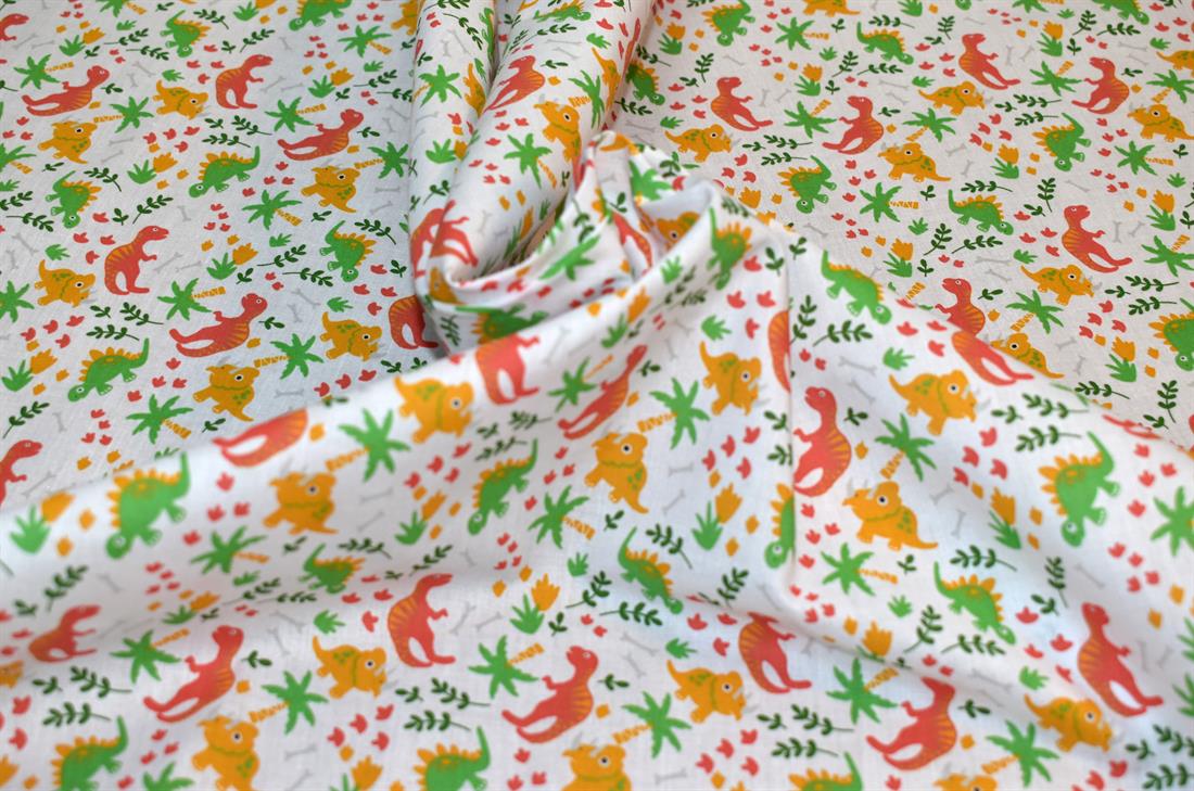 White Printed Dinosaur Polycotton Fabric
