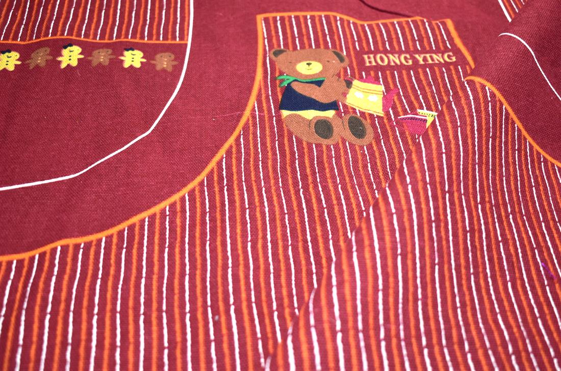 Maroon Printed Canvas Fabric